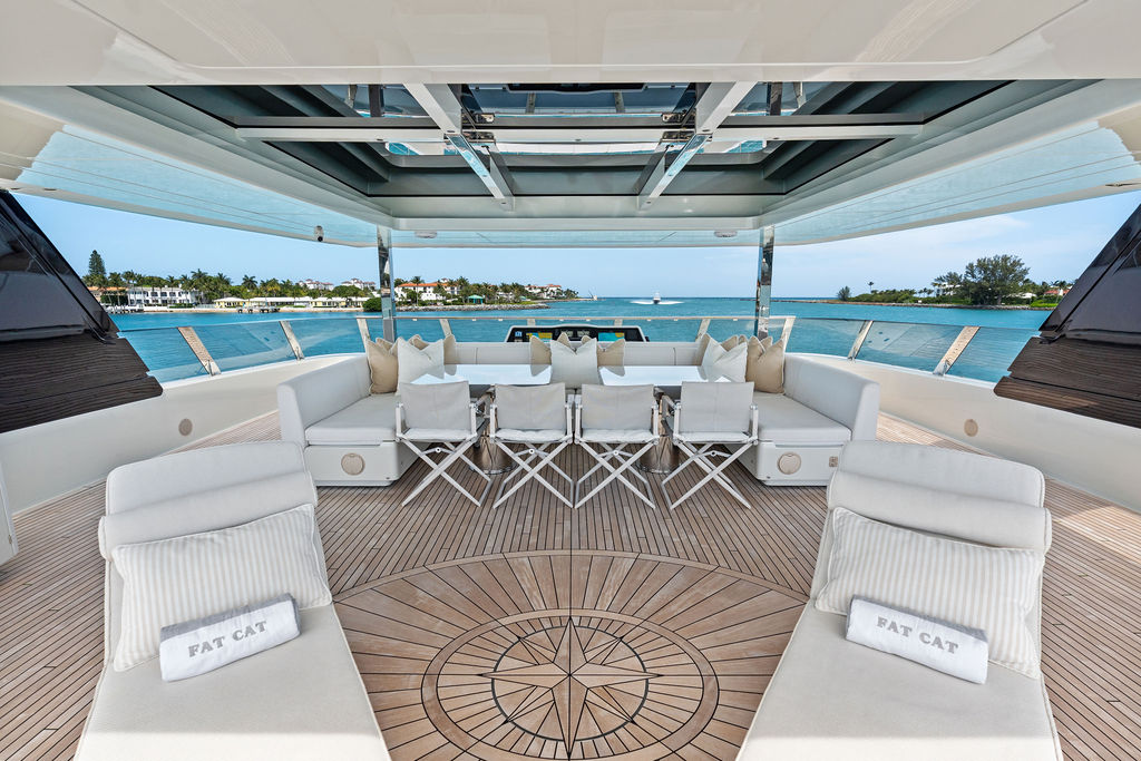 Flybridge dining with compass rose